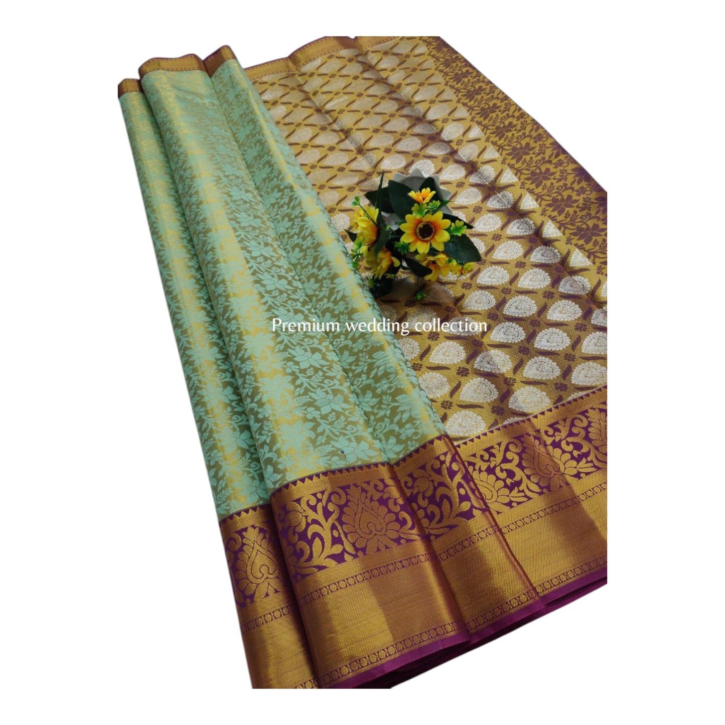 Decorative fabric with intricate patterns and a floral arrangement on a white background