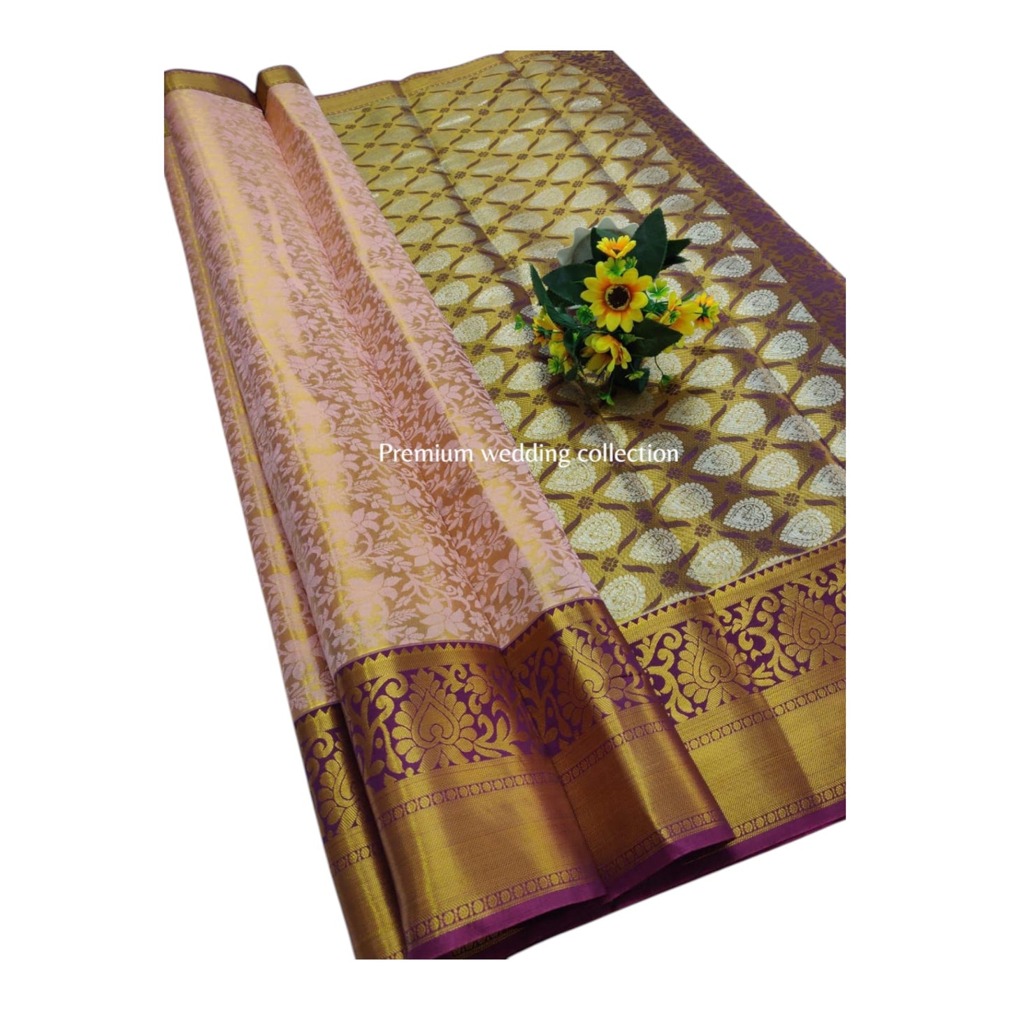 Decorative saree with floral arrangement on a white background
