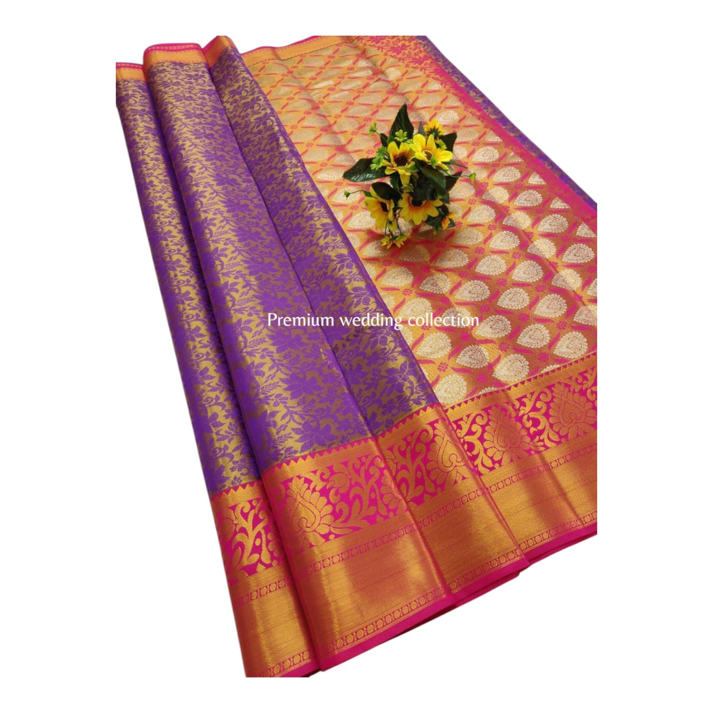 Decorative fabric with pink, purple, and gold patterns on a white background