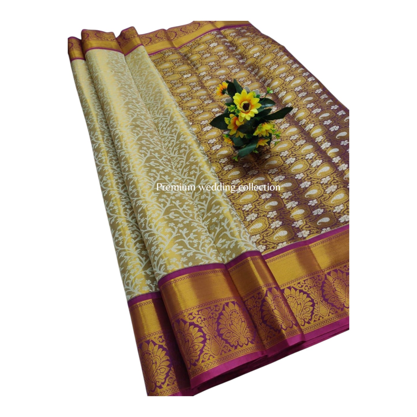 Decorative saree with floral arrangement on a white background