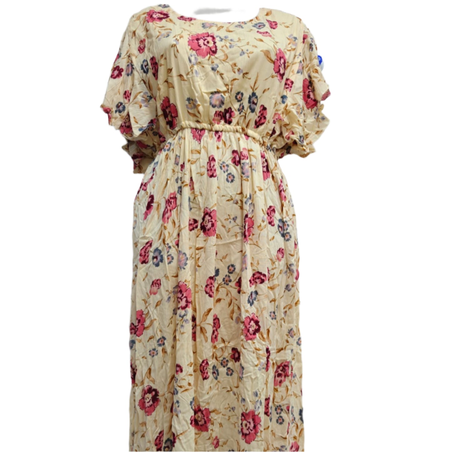 Floral dress on a mannequin against a marble wall