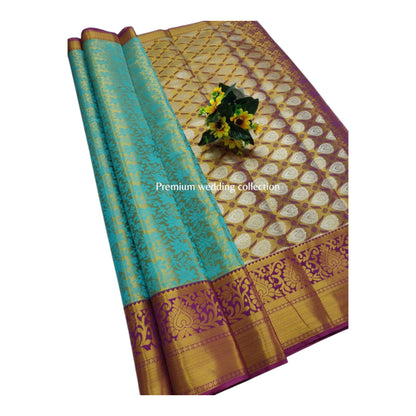 POOMBAVAI- SHINING TISSUE SILK SAREE
