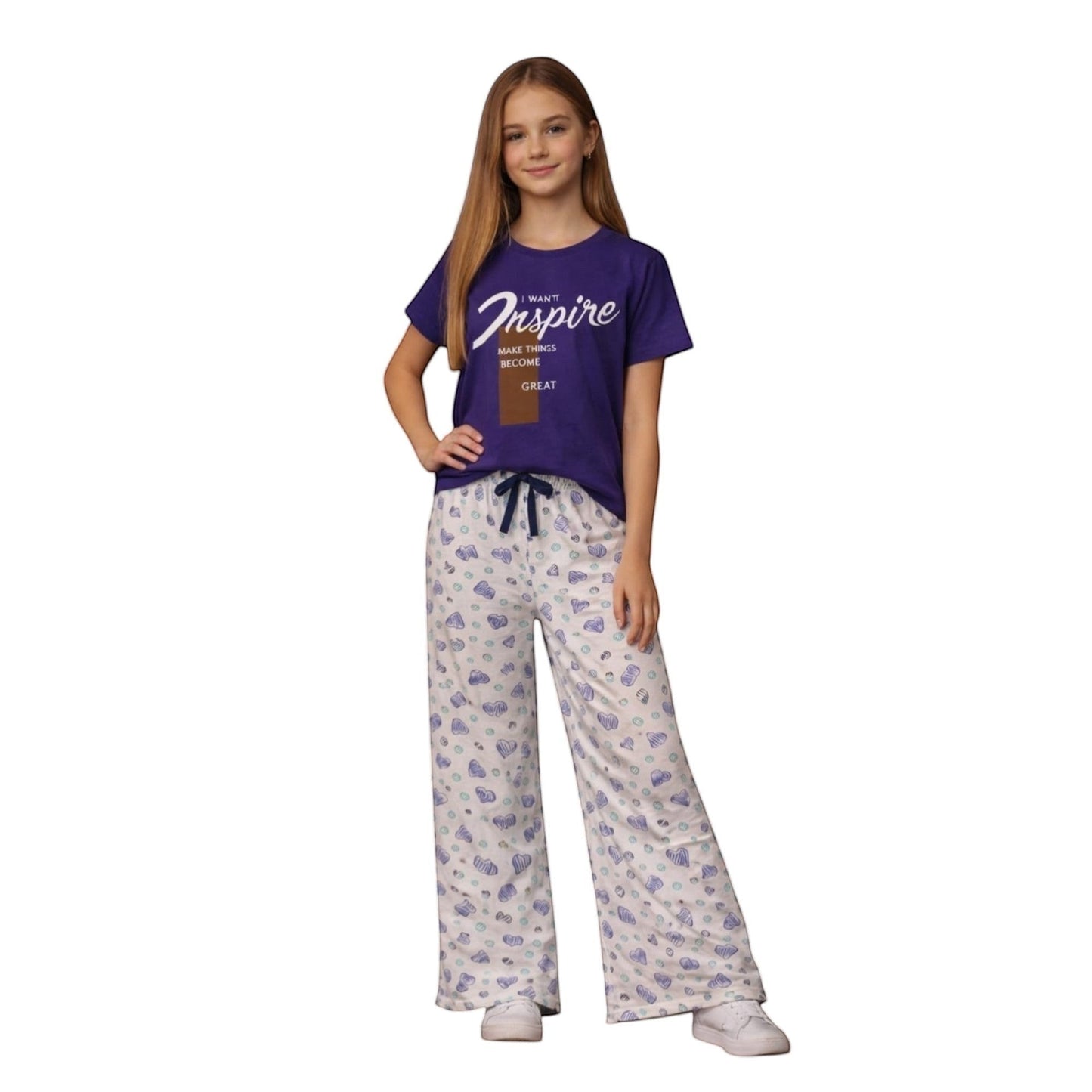 For She - Avalukaaga girl wearing purple t-shirt and white wide-leg pajama pants with a blue heart print. Adjustable drawstring waist.