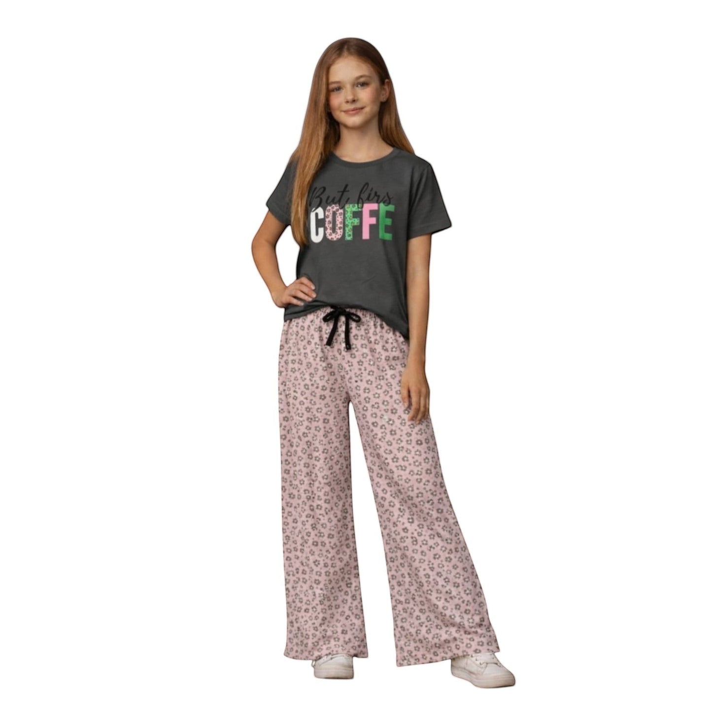 For She - Avalukaaga pink floral wide leg pajama pants with drawstring waist and a dark grey t-shirt.