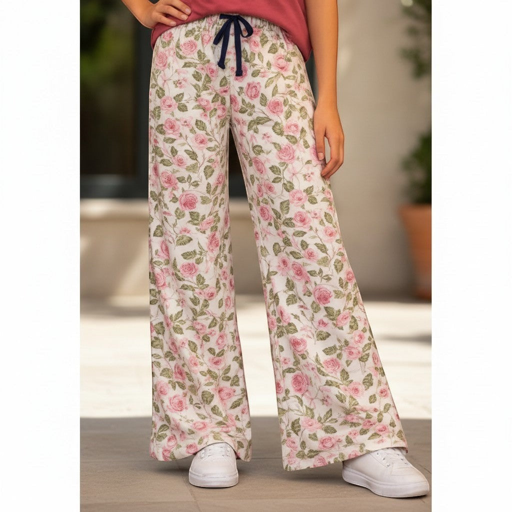 For She - Avalukaaga white pajama pants with pink roses and green leaves print, wide leg, drawstring waist.