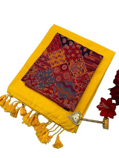 For She - Avalukaaga yellow pure soft cotton kaadhi saree with patchwork print blouse and yellow tassels.